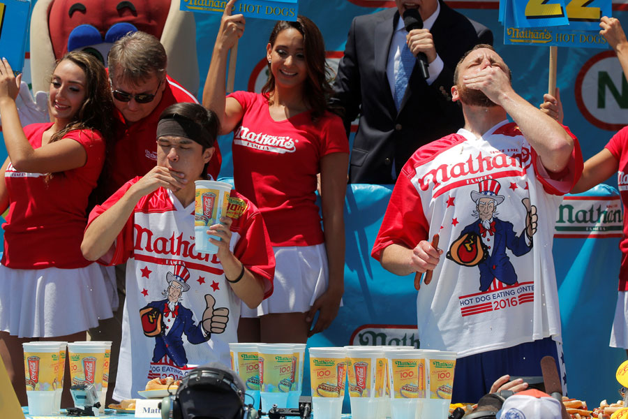 Hot dog-eating champ tastes victory again in US contest