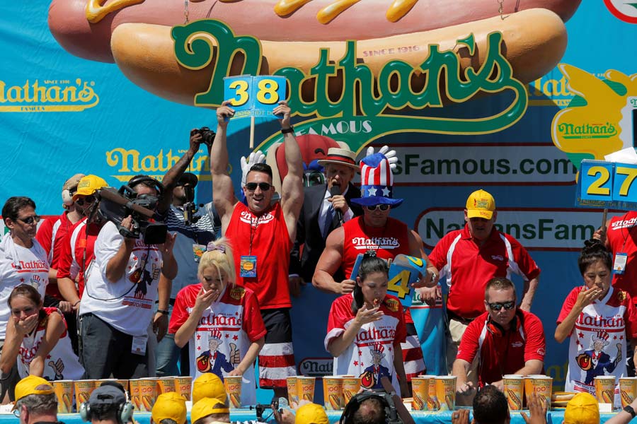 Hot dog-eating champ tastes victory again in US contest