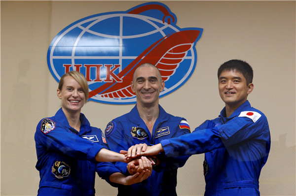 Multinational crew blasts off for space station