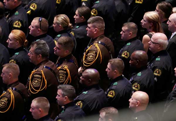 First funerals held for Dallas police slain in racially motivated ambush