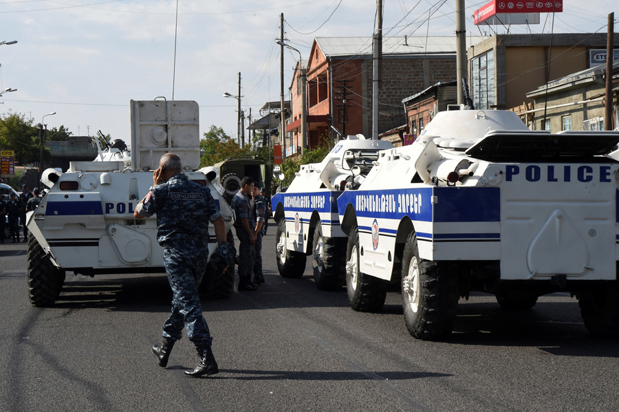 Armed men in Armenia seize police station, demand politicians' release