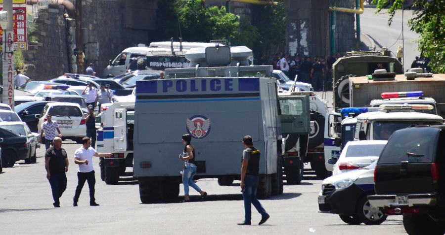 Armed men in Armenia seize police station, demand politicians' release