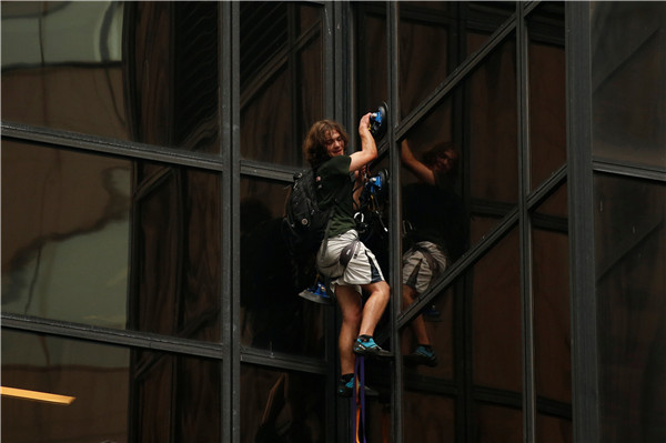 Man scaling Trump Tower in New York City pulled inside by police