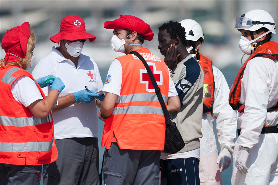 Back to safety: Spanish coast guard rescues African migrants