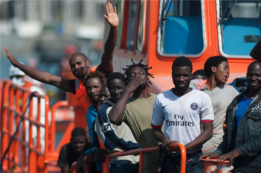 Back to safety: Spanish coast guard rescues African migrants