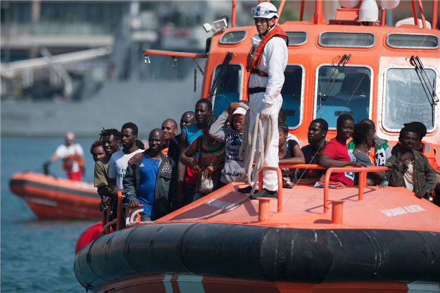 Back to safety: Spanish coast guard rescues African migrants