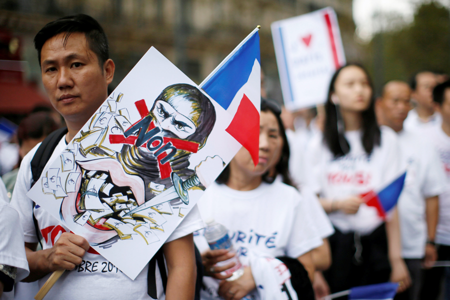 Thousands of Chinese rally in Paris to call for 'security for all'