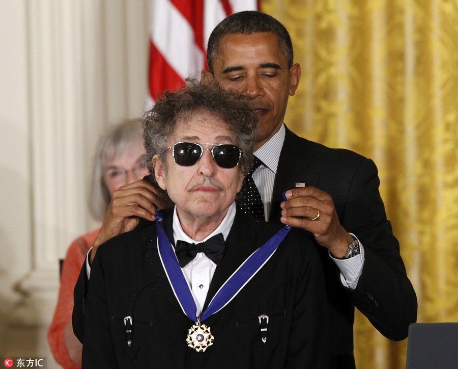 'Greatest living poet' Bob Dylan wins Nobel literature prize