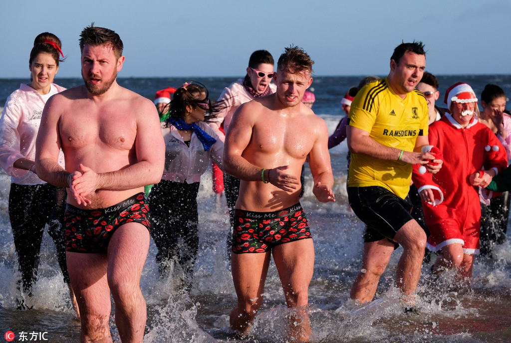 Boxing Day swimmers brave icy North Sea