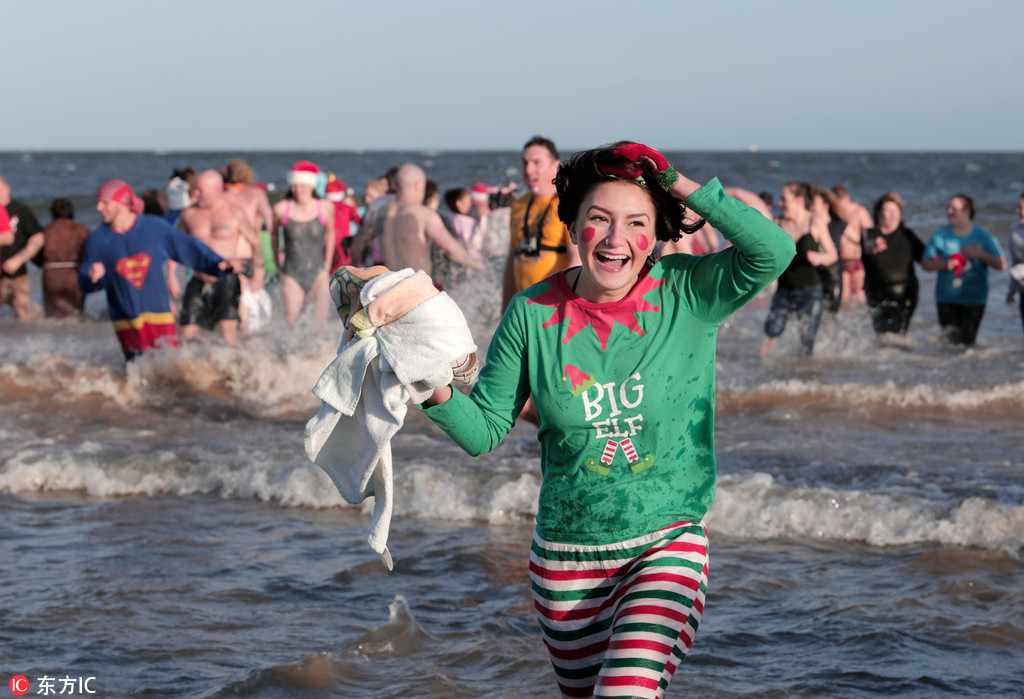 Boxing Day swimmers brave icy North Sea