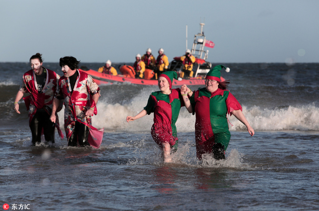 Boxing Day swimmers brave icy North Sea