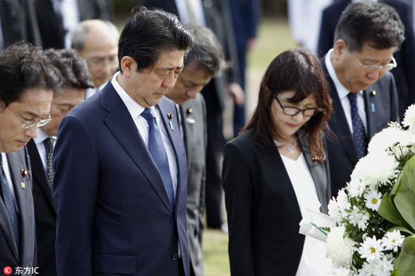 Abe pays respects at Hawaii memorials