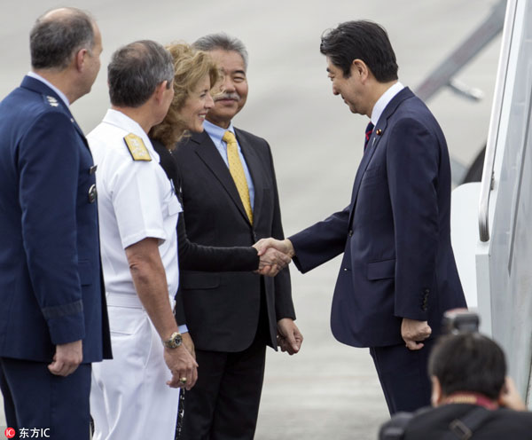 Abe pays respects at Hawaii memorials