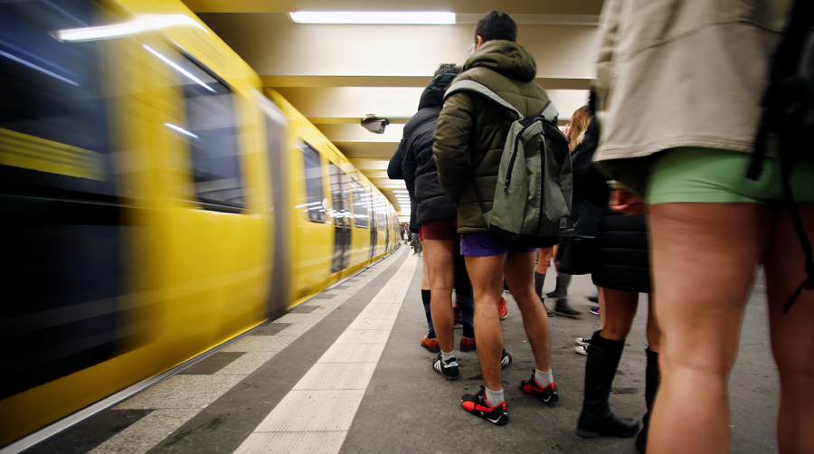 People take part in the annual 'No Pants Subway Ride' in Europe