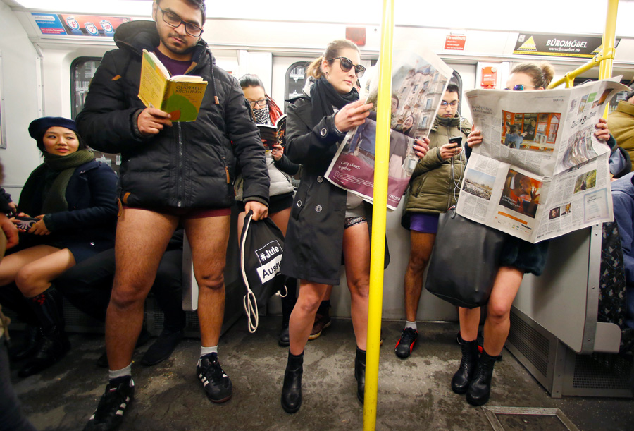 People take part in the annual 'No Pants Subway Ride' in Europe