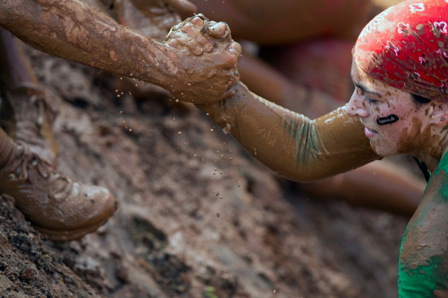 Israelis battle through miles of obstacles for 'Mud Day'