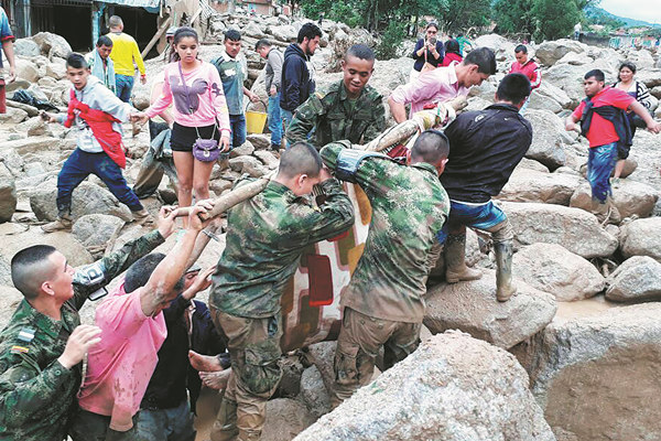 Mudslides kill more than 200, sweep homes away