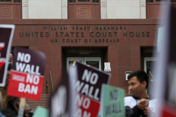 US appeals court hears case against Trump's travel ban