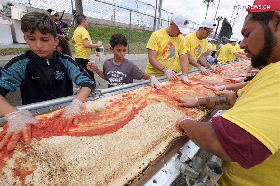 World's longest pizza breaks Guinness Records in US