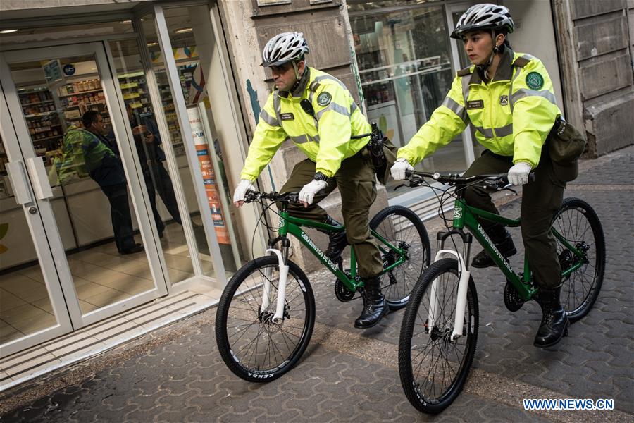 China donates bicycles for local police patrols in Santiago, Chile