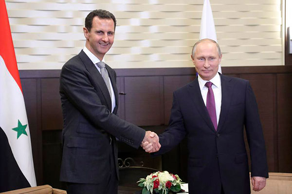 Syria's Assad travels to meet with Putin
