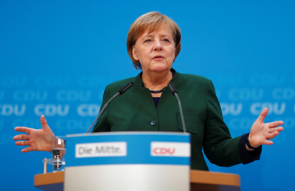 Merkel's CDU agrees to pursue coalition