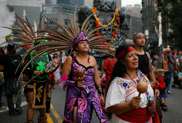 Tens of thousands crowd New York streets for climate march