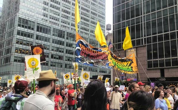 Tens of thousands crowd New York streets for climate march