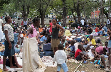 Panic, looting and triage after Haiti quake