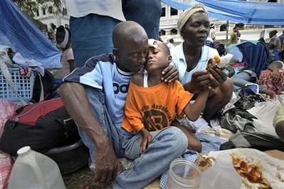 Haitians desperate for supplies; rescues continue