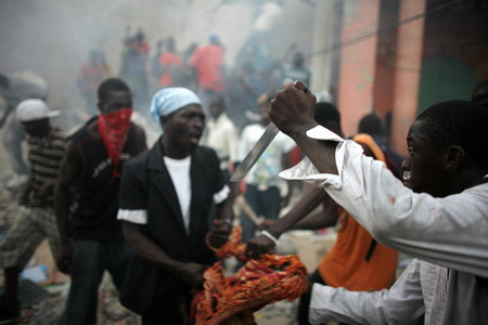 Haitian capital sees riots for goods