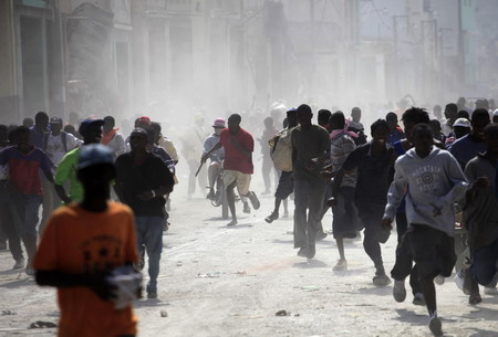 Haitian capital sees riots for goods