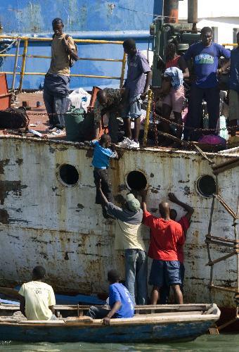 Haitians flee homeland by boat as in movie '2012'