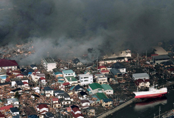 NE Japan coast ravaged by flood, fires after quake