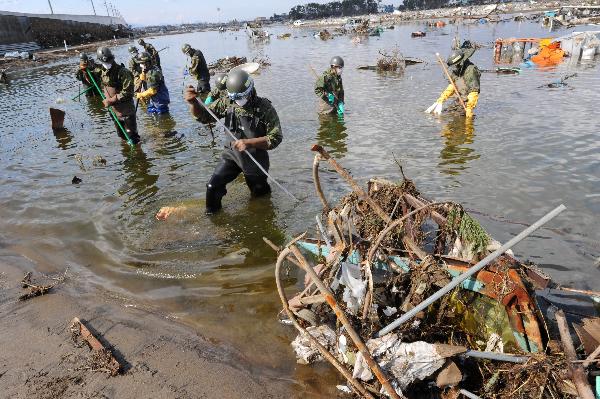 Death toll rises to 10,872 from Japan quake