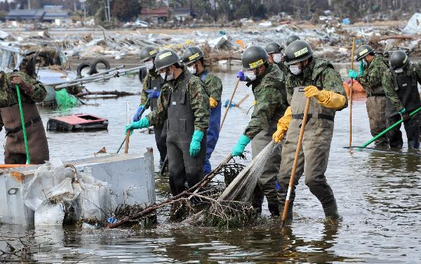 Death toll rises to 10,872 from Japan quake