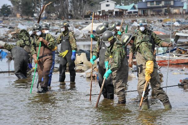 Death toll rises to 10,872 from Japan quake